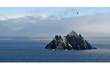 Two precipitous, rocky, uninhabited islands, situated 16 km west of Bolus Head on the Iveragh peninsula in County Kerry. Great Skellig reaches a height of 240 m and is the site of an old Celtic monastery. Little Skellig lies 1 km to its north-east and reaches 134 m in height. Great Skellig is popular with day-trippers